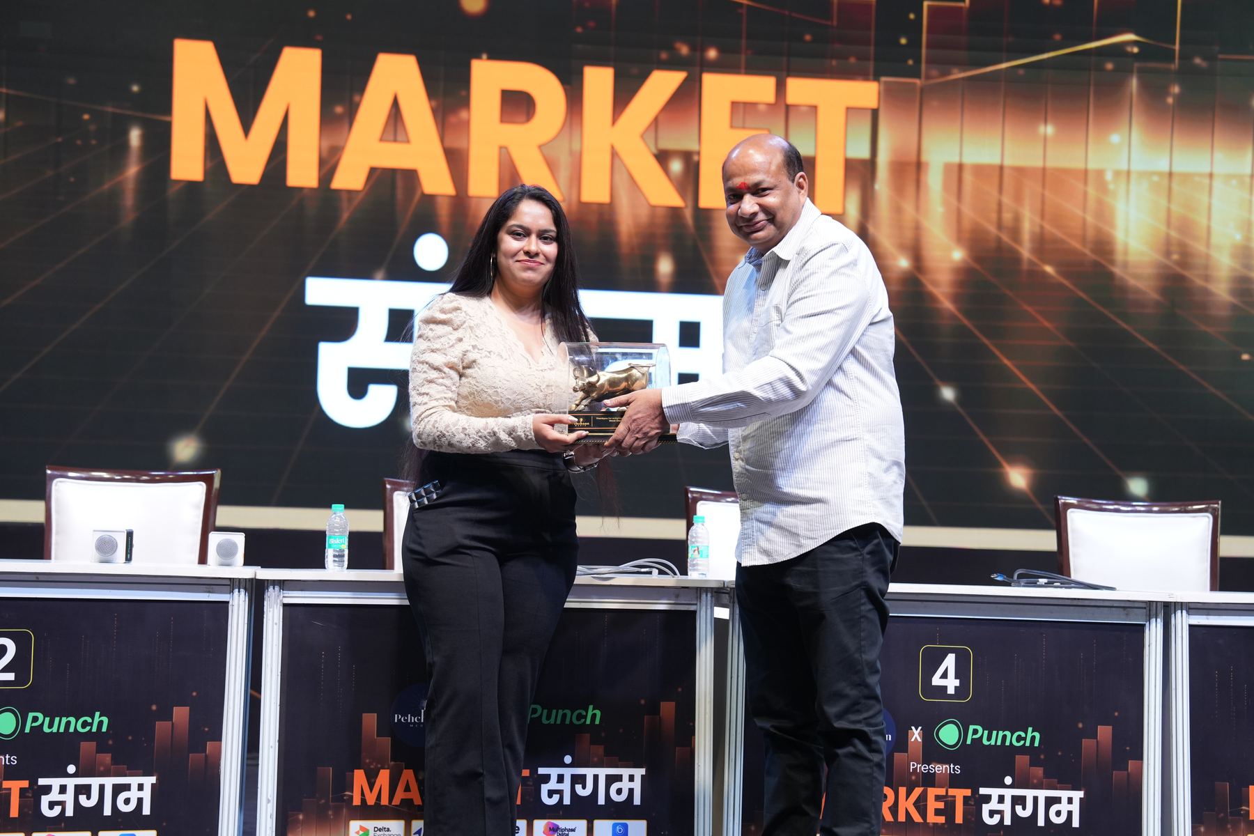 Award presentation on stage